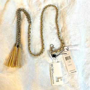 BCBG Silver Tone Metal With Sand Color Faux Leather And Tassels Retail 42.00 NWT